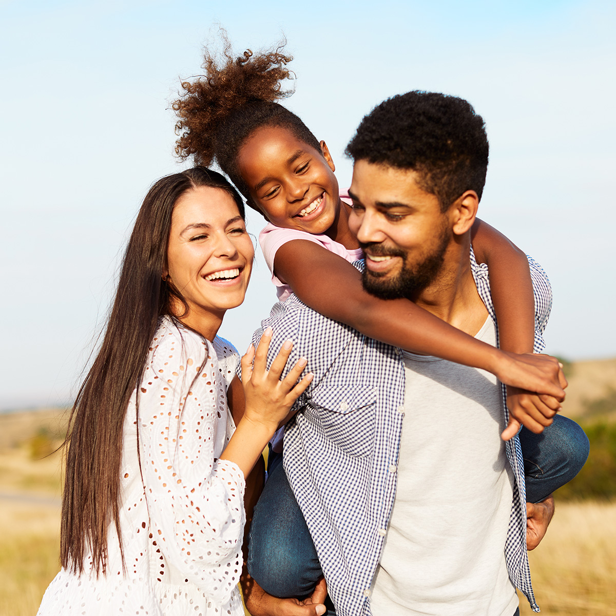 Family having fun playing outdoors